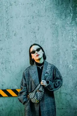 female fashion picture elegant woman posing with jacket sunglasses 
