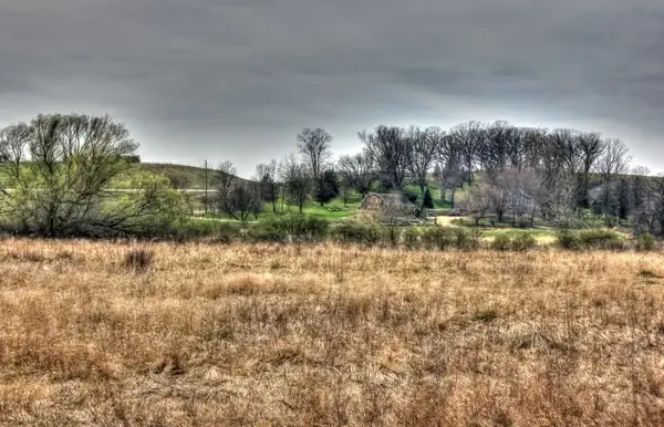 fields and house on the military ridge state trail