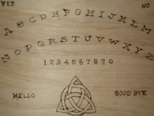 hand made ouija board close up