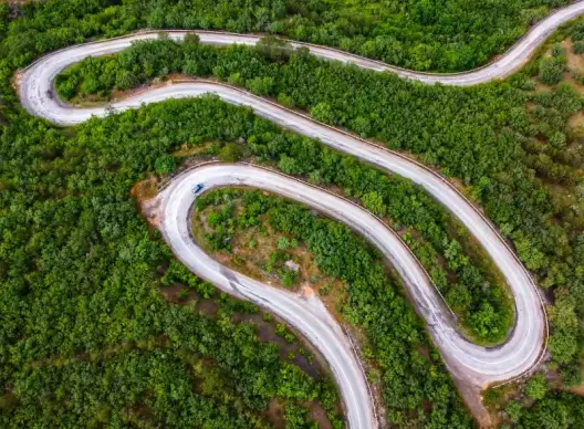 high land scenery picture curvy road forest trees high view