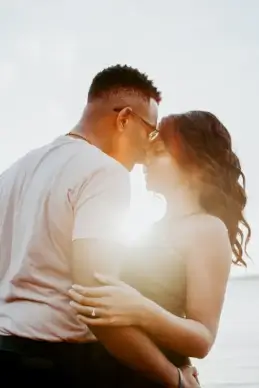 love picture romantic kissing couple sparkling sunlight