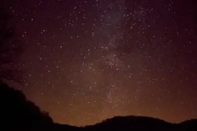 milky way above the hills at hogback prairie wisconsin