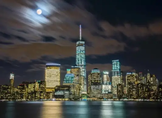 new york city nighttime picture modern architectures scene 