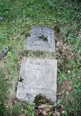 old broken headstone