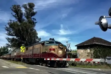passenger train crossing street