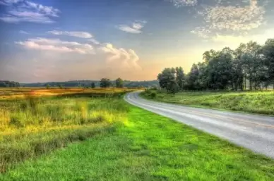 road to the sunset at chain o lakes state park illinois