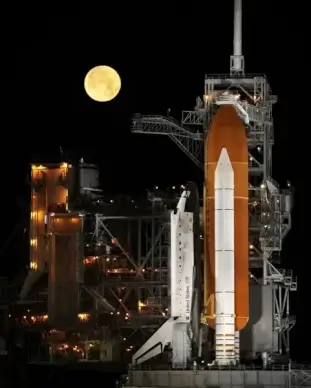 rocket launch night space shuttle
