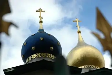 russian orthodox church of all russian saints lovely and elegant blue and gold domes between the fence spires burlingame california usa