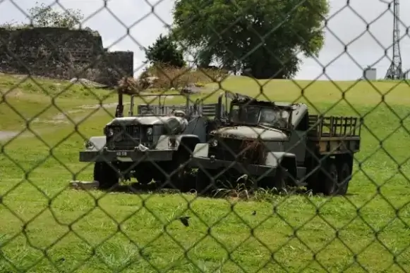 rusting army trucks
