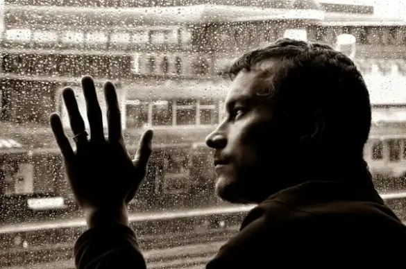 sad man and rain