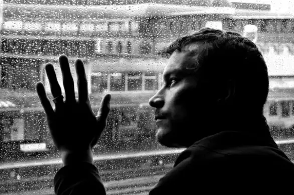 sad man and rain