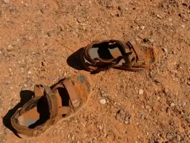 sandals shoes dirt