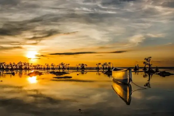 sea scene picture tranquil beach dark sunset boat
