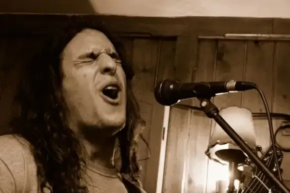 singer at open mic