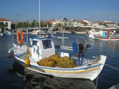 skala kalloni greece fishing boat
