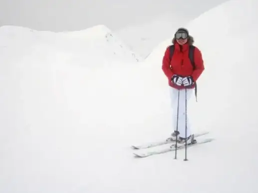 skier at mountain peak