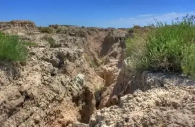 steep ravine climb at badlands national park south dakota