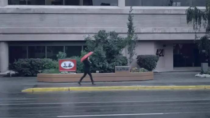 stylish woman walking on town with red umbrella