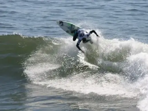 surfer goes airborne