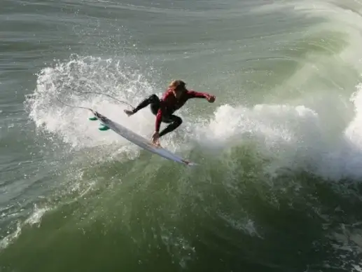 surfer goes airborne