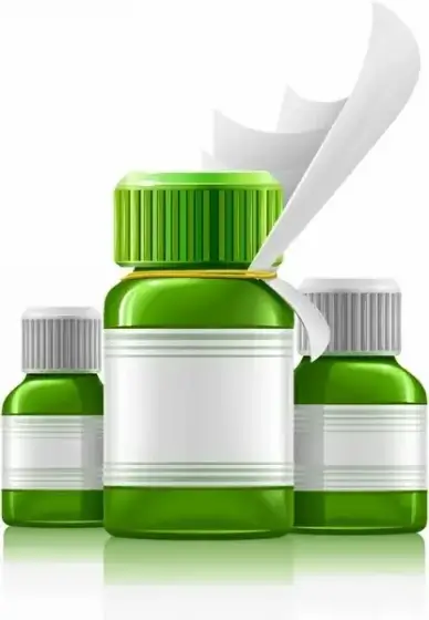 three green medical bottles with medication