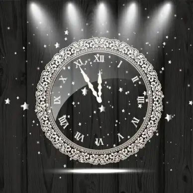 vintage clock decoration on wooden background and lights