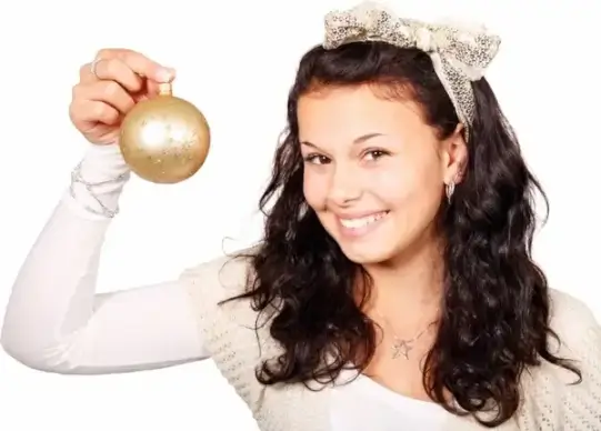woman with christmas bulb
