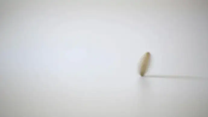 yellow coin rotating at full speed