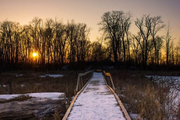 a boardwalk to sunset at horicon national wildlife reserve wisconsin