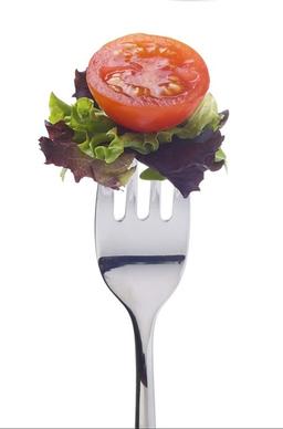 a fork and vegetables stock photo