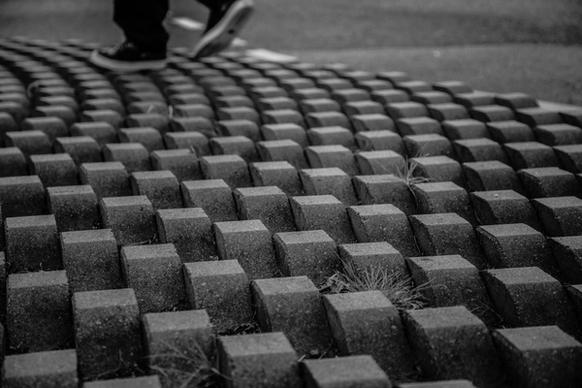 abstract audience background black and white brick