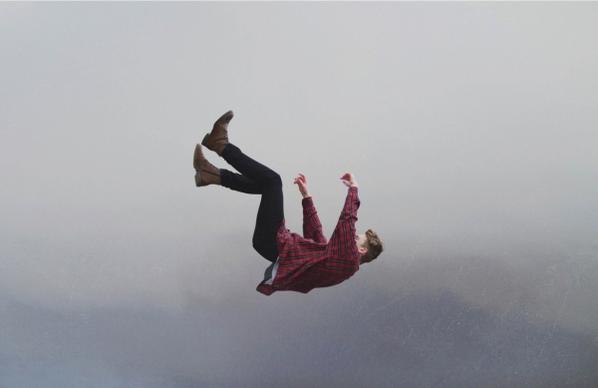 young man with free falling posing style
