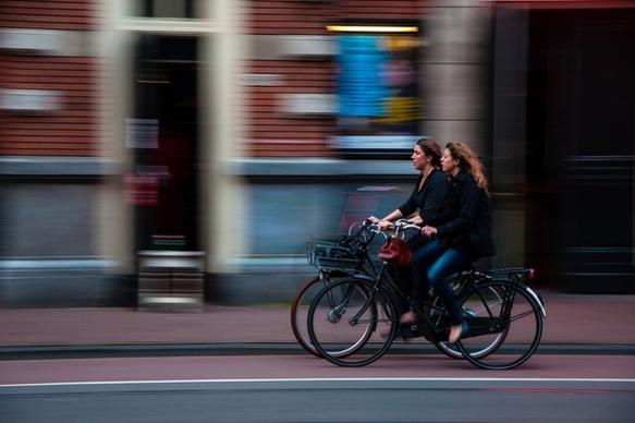 action bicycle bike biker blur city cyclist fast