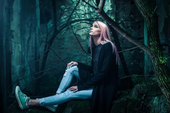 beautiful stylish woman in forest
