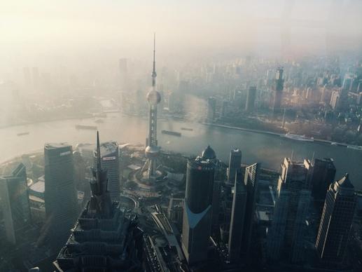 aerial boat building china city down haze landmark
