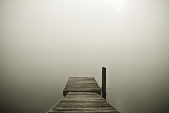 alone beach black and white fog foggy jetty