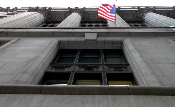 american flag on side of building with columns