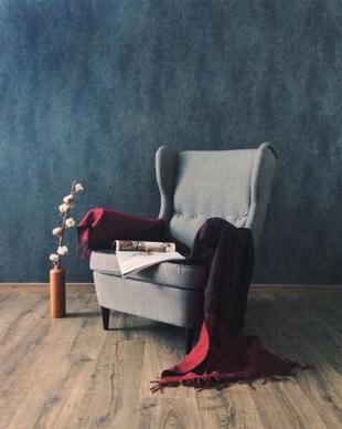 armchair chair with newspaper