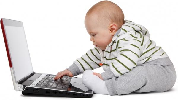 baby working on a laptop