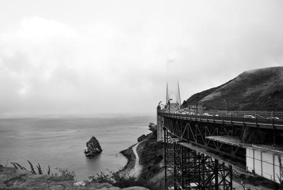 beach black and white boat bridge coast fog harbor
