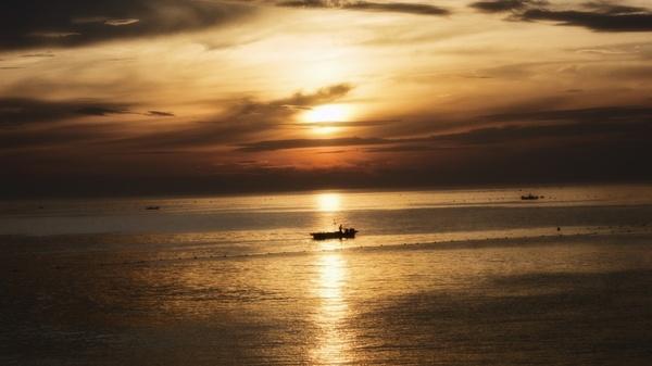 beach boat calm dawn dusk evening lake landscape