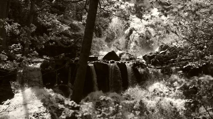 black white video of fierce waterfall flow