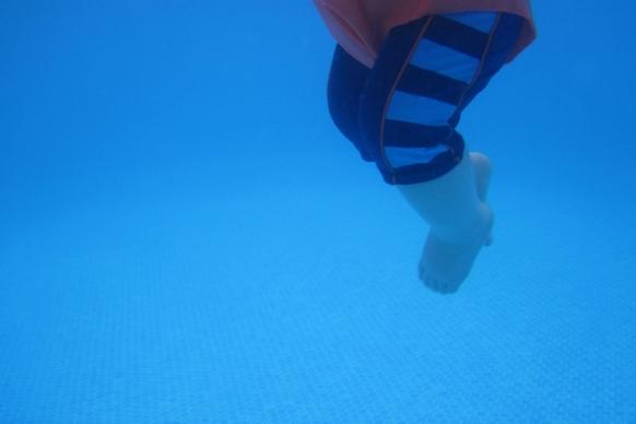 blue underwater infant