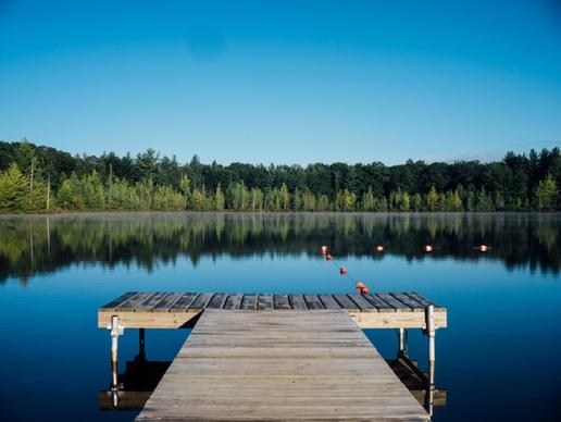 boat calm dock forest lake leisure nature outdoors
