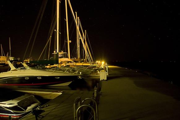 boats at night in the harbor at ellison bay wisconsin