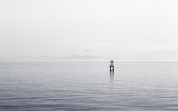 buoy calm horizon lake ocean reflection ripple water
