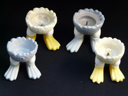 candle holders feet egg cups
