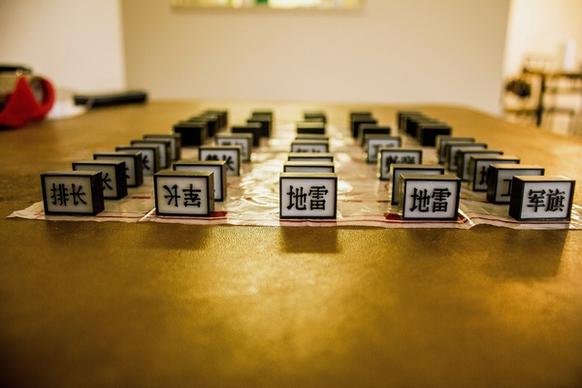 chinese army chess setup on a table