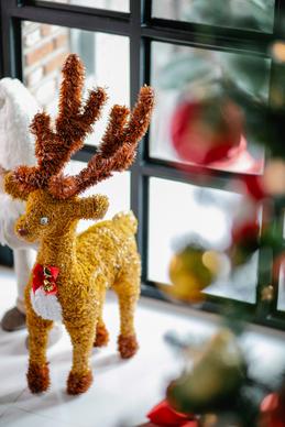 christmas background picture elegant closeup reindeer toy window