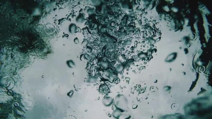 closeup of bubbles floating in water